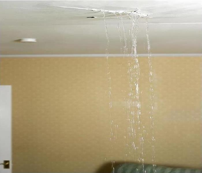 Water leaking from a crack in the ceiling